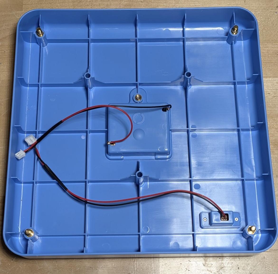 The control board housing. Battery compartment center, power switch bottom right.