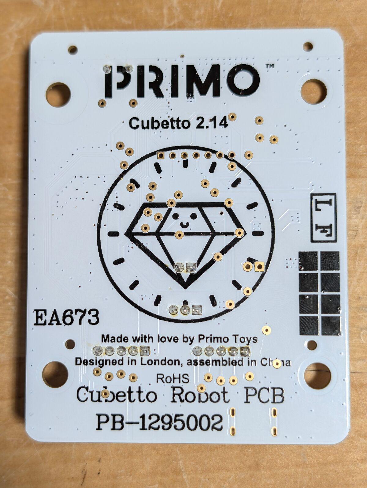 Robot PCB back, 'Cubetto 2.14'. The control board says 2.19. Mismatched versions shipped in the same box.