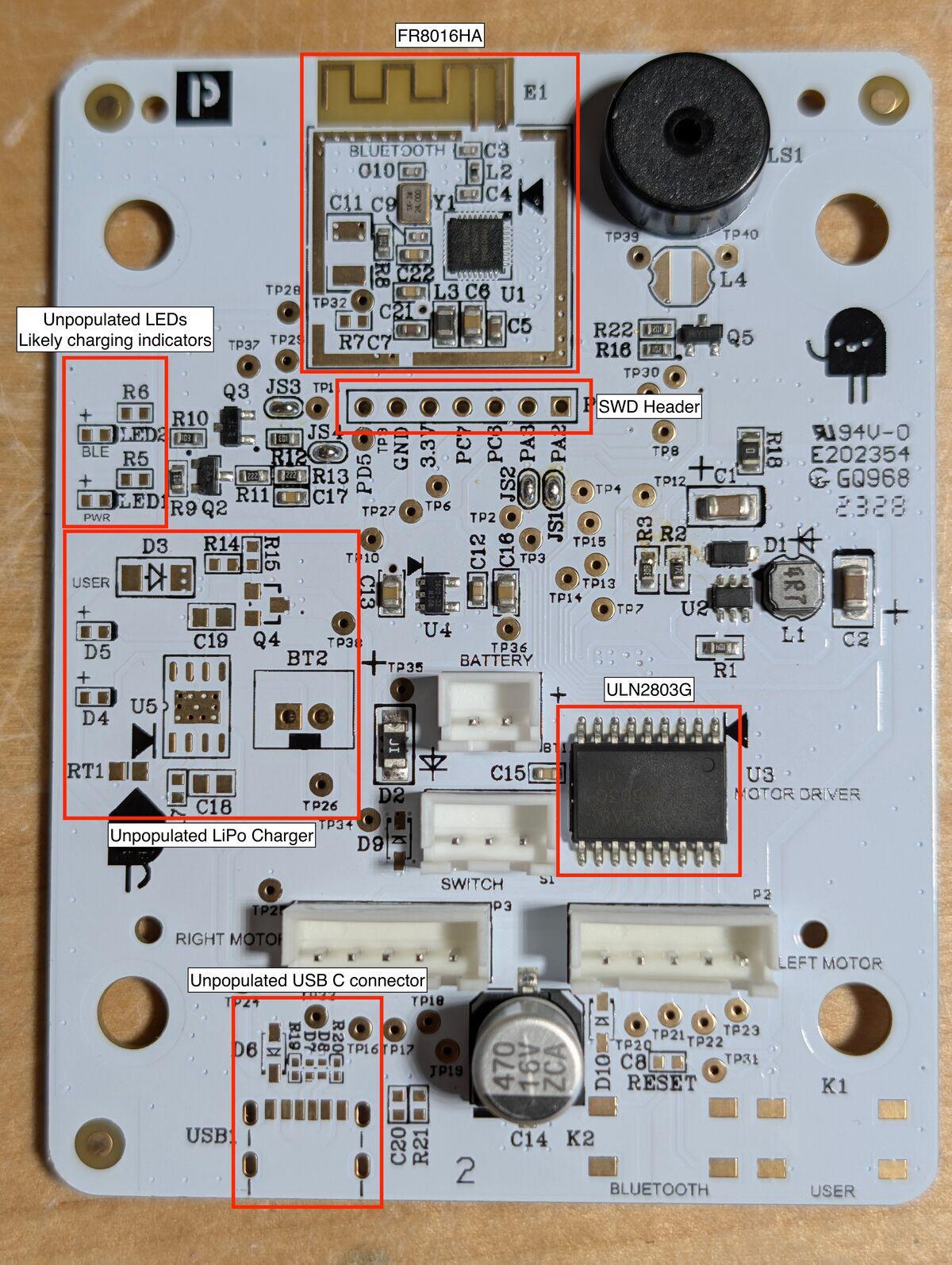 The robot PCB. FR8016HA BLE SoC, ULN2803G Darlington array labeled 'MOTOR DRIVER', unpopulated USB-C and LiPo charging circuit, and an SWD debug header as the only firmware path.