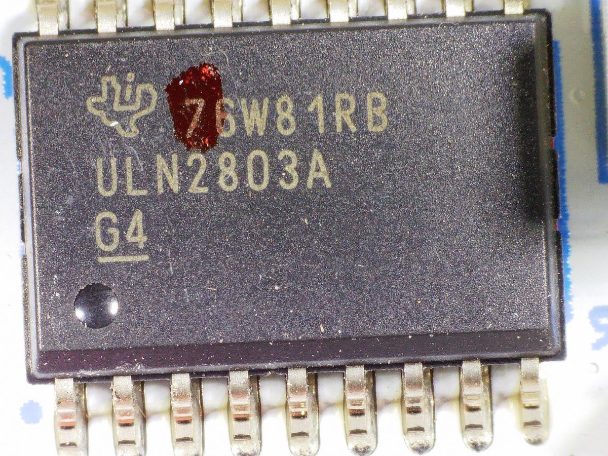 Texas Instruments ULN2803A Darlington array. Present on both the original and replacement robot boards.