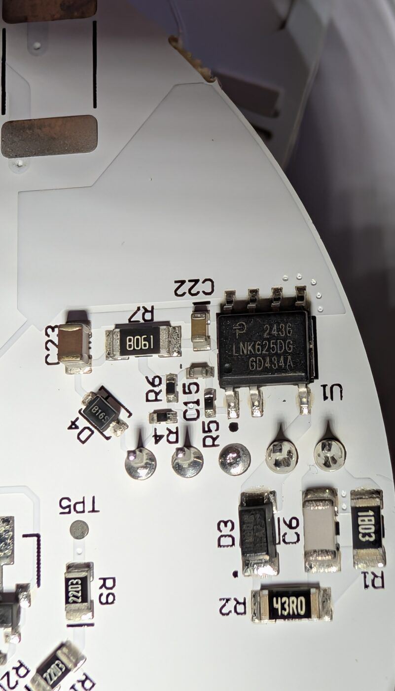 The Wall's power stage: an LNK625DG (U1) off-line switcher. Non-isolated — the board's ground is not earth. Flash it off-mains, and treat it as live the whole time.